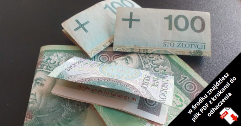 Polskie banknoty, w tym 100 i 200 złotych, są rozłożone. Etykieta w języku polskim w prawym dolnym rogu mówi: 