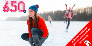 Uśmiechnięta kobieta w zimowym ubraniu klęczy na lodowisku, w tle dwie osoby jeżdżące na łyżwach. Duży różowy tekst brzmi "do 650 zł". Czerwony baner głosi: "W środku znajdziesz plik PDF z krokami do dołączenia.